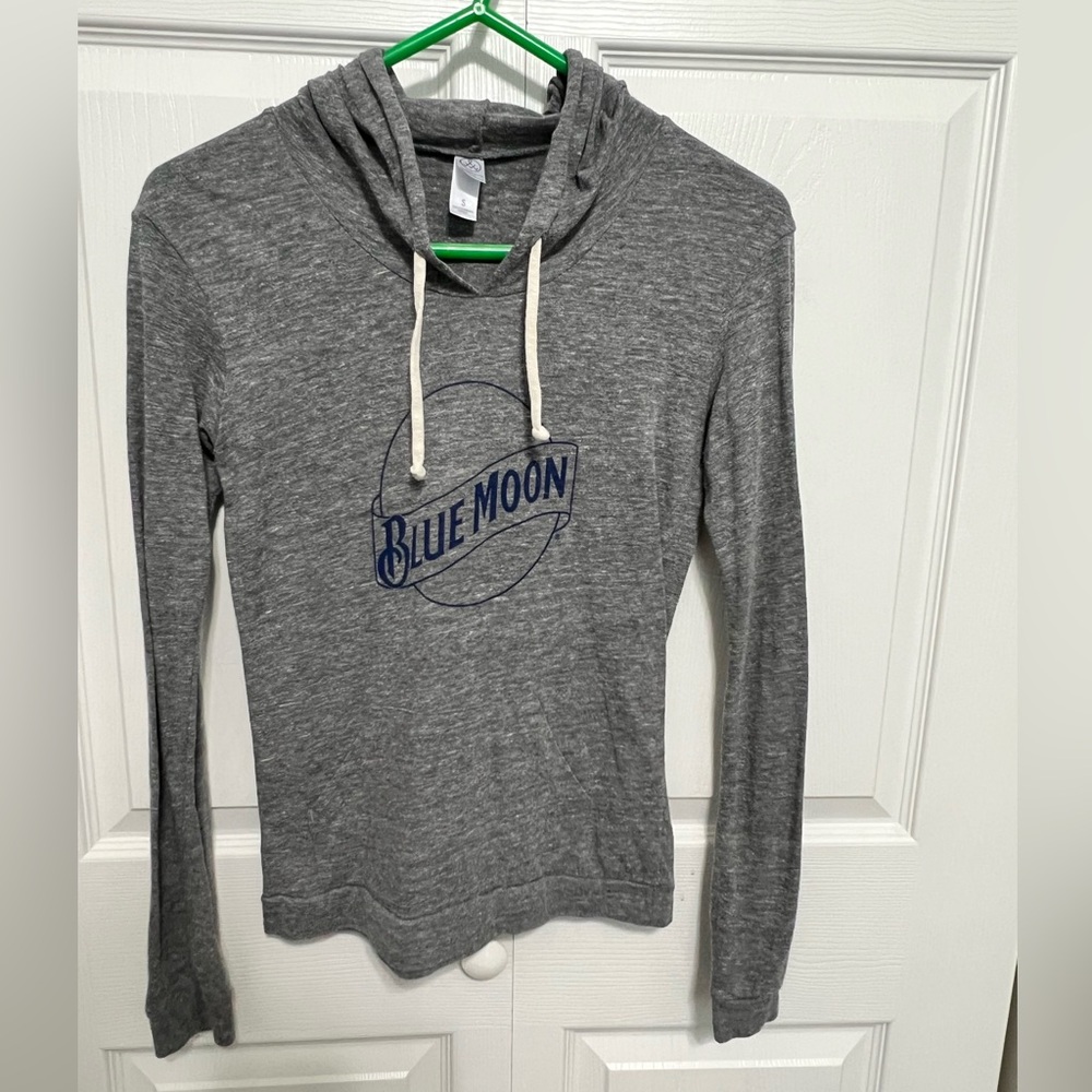 Blue Moon long sleeve lightweight pullover with a hood.